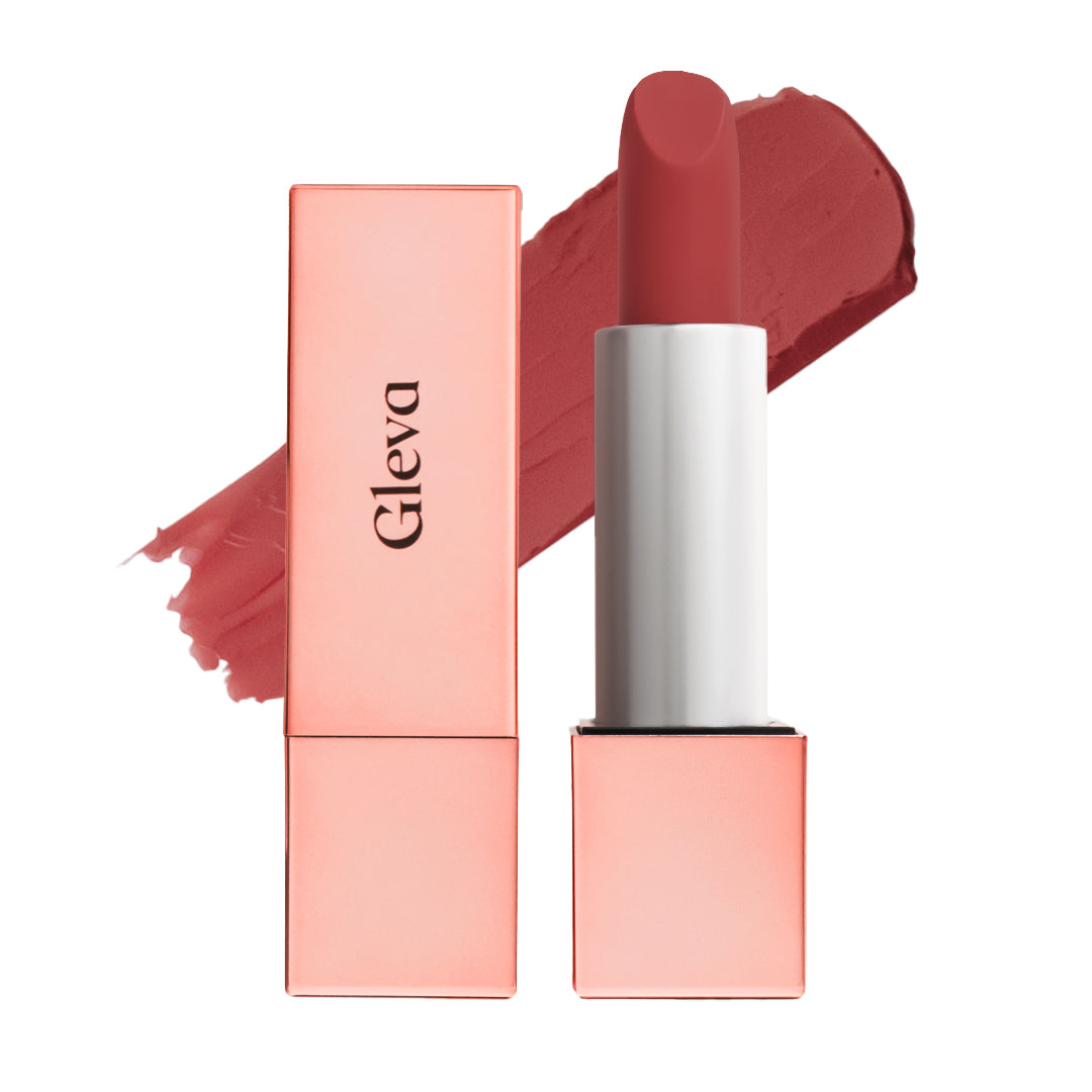 Creamy Matte Lipstick in Dusty Brick, open bullet beside its case with a swatch