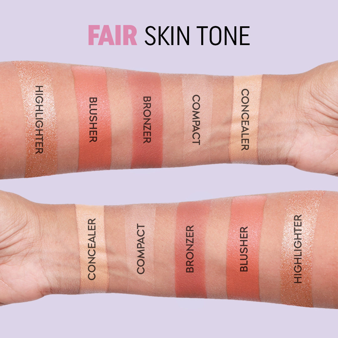 Fair tone: highlighter, blusher, bronzer, compact and concealer swatched in labelled stripes on two forearms